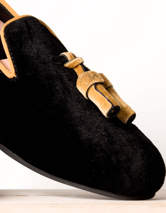 black and gold loafers